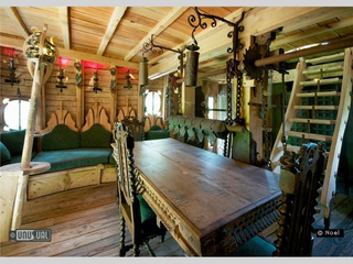 Illustration for article titled This fantasy-themed bed and breakfast lets you sleep inside a Trojan bull